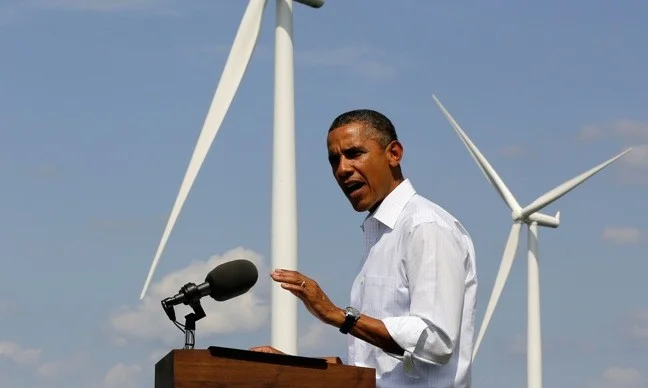 U.S. President Obama delivers a statement to media about energy on the Heil Family Farm while in Haverhill