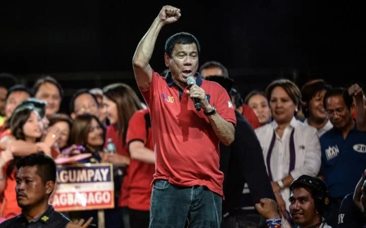 97253077_Presidential-candidate-Davao-Mayor-Rodrigo-Duterte-speaks-to-supporters-during-an-election-large_trans++eo_i_u9APj8RuoebjoAHt0k9u7HhRJvuo-ZLenGRumA