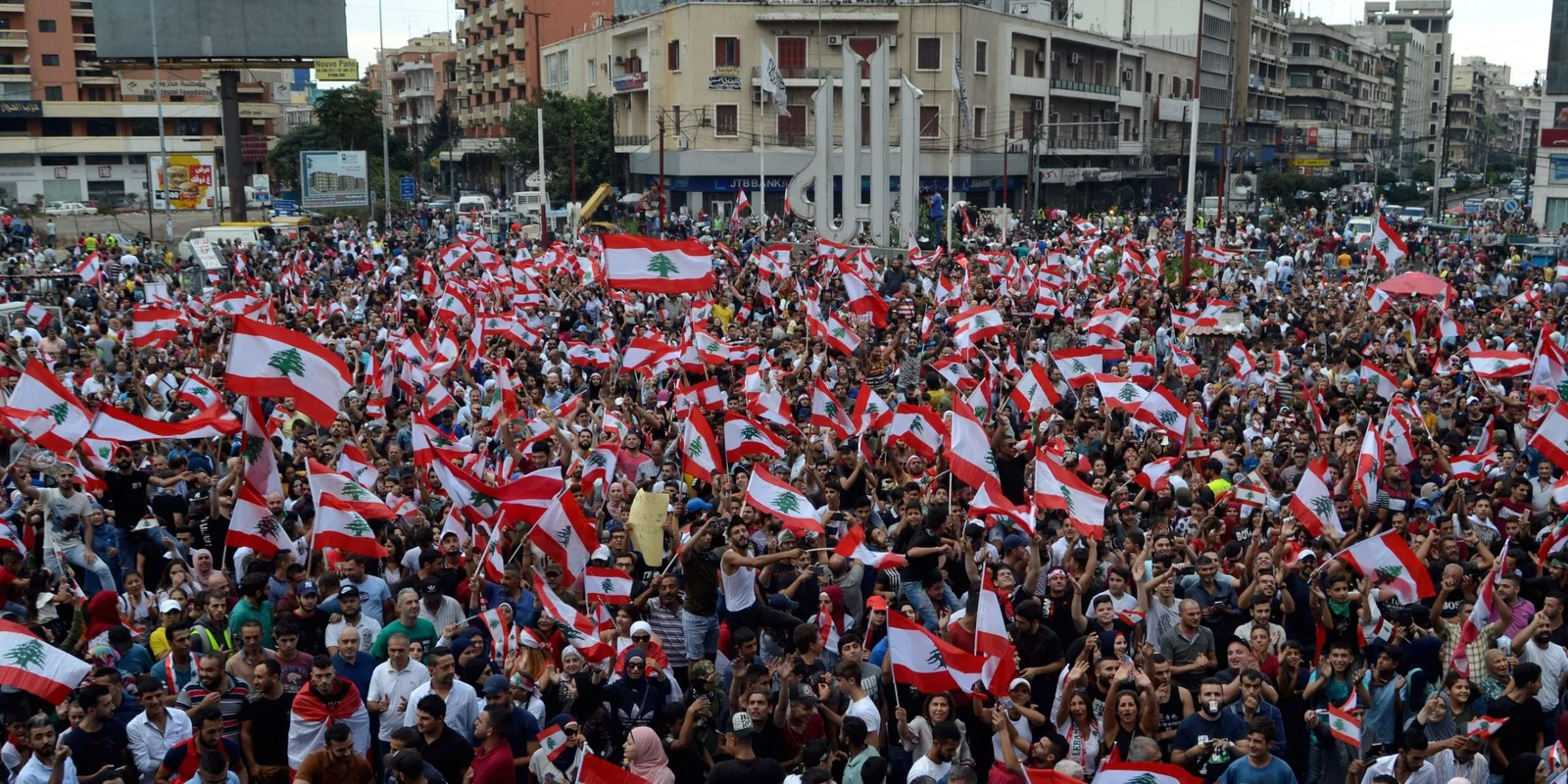 Demonstrators take part in an anti-government protest in Tripoli