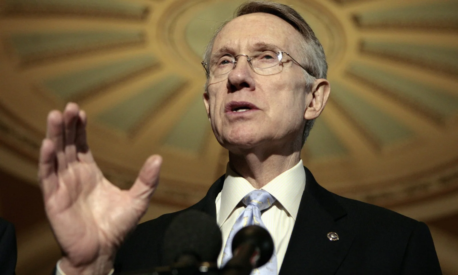 Senator Harry Reid speak to reporters in the Capitol in Washington